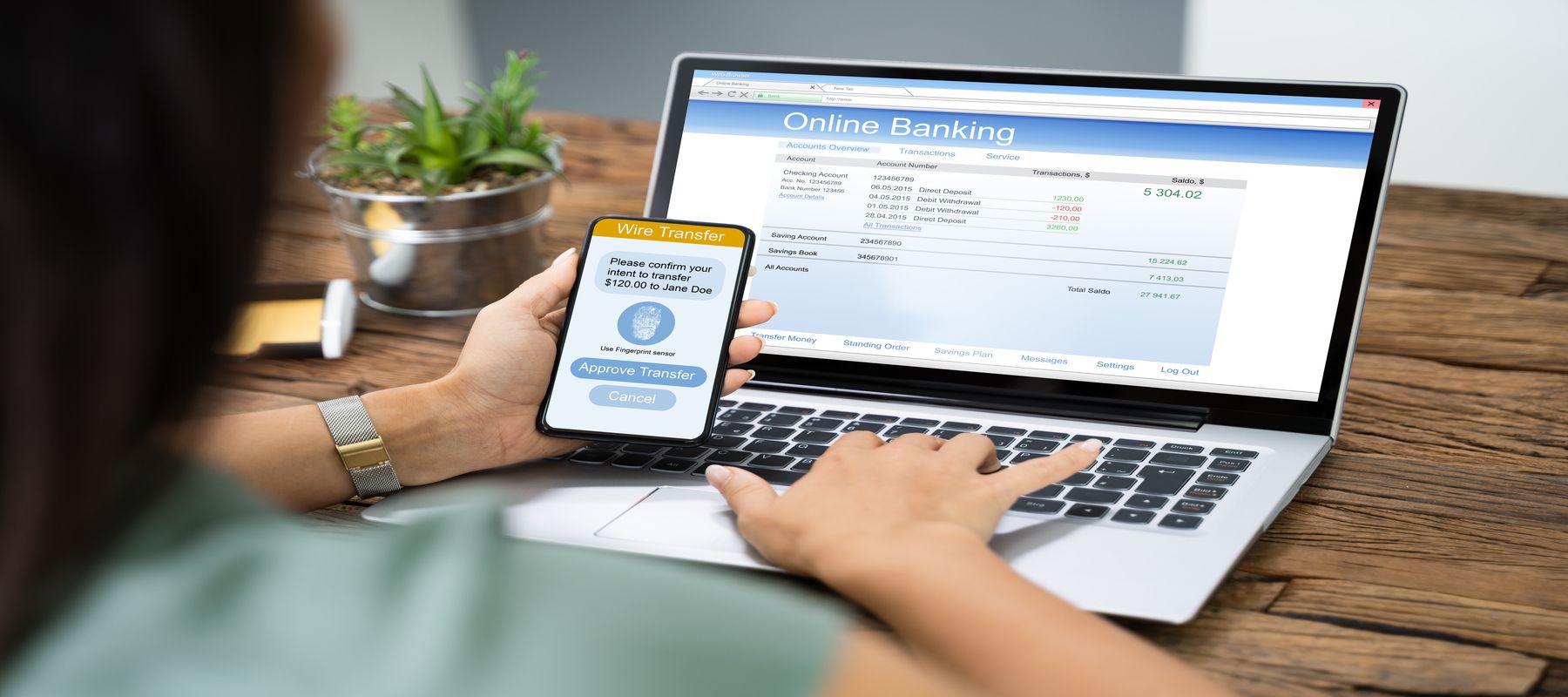 Woman banking online laptop and mobile app